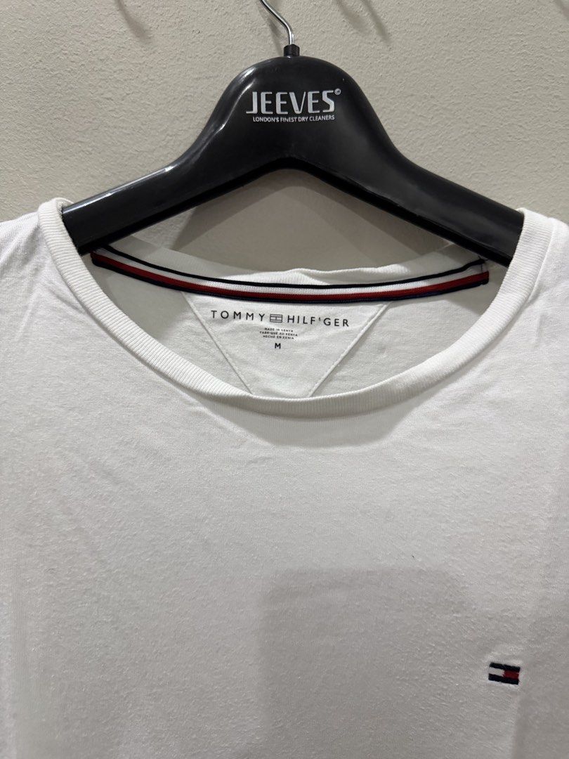 Tommy Hilfiger T-Shirt (Category: Tshirts & Polo Shirts ) located in Pasig City. Submitted by dey2x (Listing ID 1459261726, Image 2). Description: RFS: decluttering -Meetups can be arranged -Delivery via Grab Express/Lalamove/J&T/LBC (c/o buyer) PLEASE TAKE NOTE: This is preowned. Expect signs of usage. NO RETURN POLICY. NO EXCHANGE OF ITEMS..