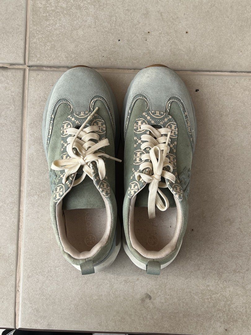 Tory Burch T Monogram Green Trainer - Womens Size 10 (Category: Sneakers) located in Manila. Submitted by pacoz (Listing ID 1459224461, Image 2). Description: - Sage green Tory Burch sneakers - Features signature monogram pattern - Lace-up style with a chunky sole - Durable gum rubber outsole - Ideal for casual outfits - Women’s Size 10 Only worn once. RFS: Decluttering Gifted from the US. SRP: ₱17k.