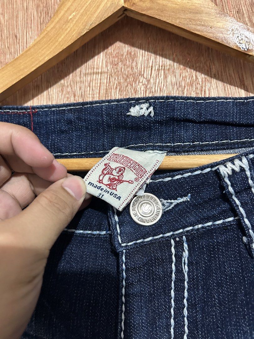 True Religion Denim Shorts Size 31 (Category: Shorts) located in Davao. Submitted by orbetaarch23339 (Listing ID 1459269737, Image 2). Description: - Brand: True Religion - Style: Dark wash denim shorts - Features: Classic stitching detail on pockets, button and zip closure - Origin: Made in USA - Size: 31 - Occasion: Great for casual wear.