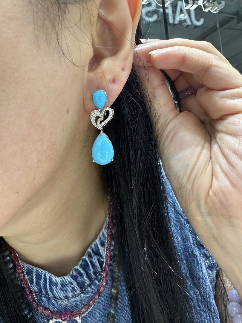 Turquoise & Diamond Heart Dangle Earrings Sterling Silver (Category: Earrings) located in San Juan City. Submitted by fabbagger62976 (Listing ID 1459253306, Image 2). Description: - Beautiful arizona turquoise and diamond earrings (natural) - Heart-shaped design with teardrop turquoise stones - Sterling silver setting - Adds a pop of color to any outfit - Lightweight and comfortable - Ideal for special occasions or everyday wear.