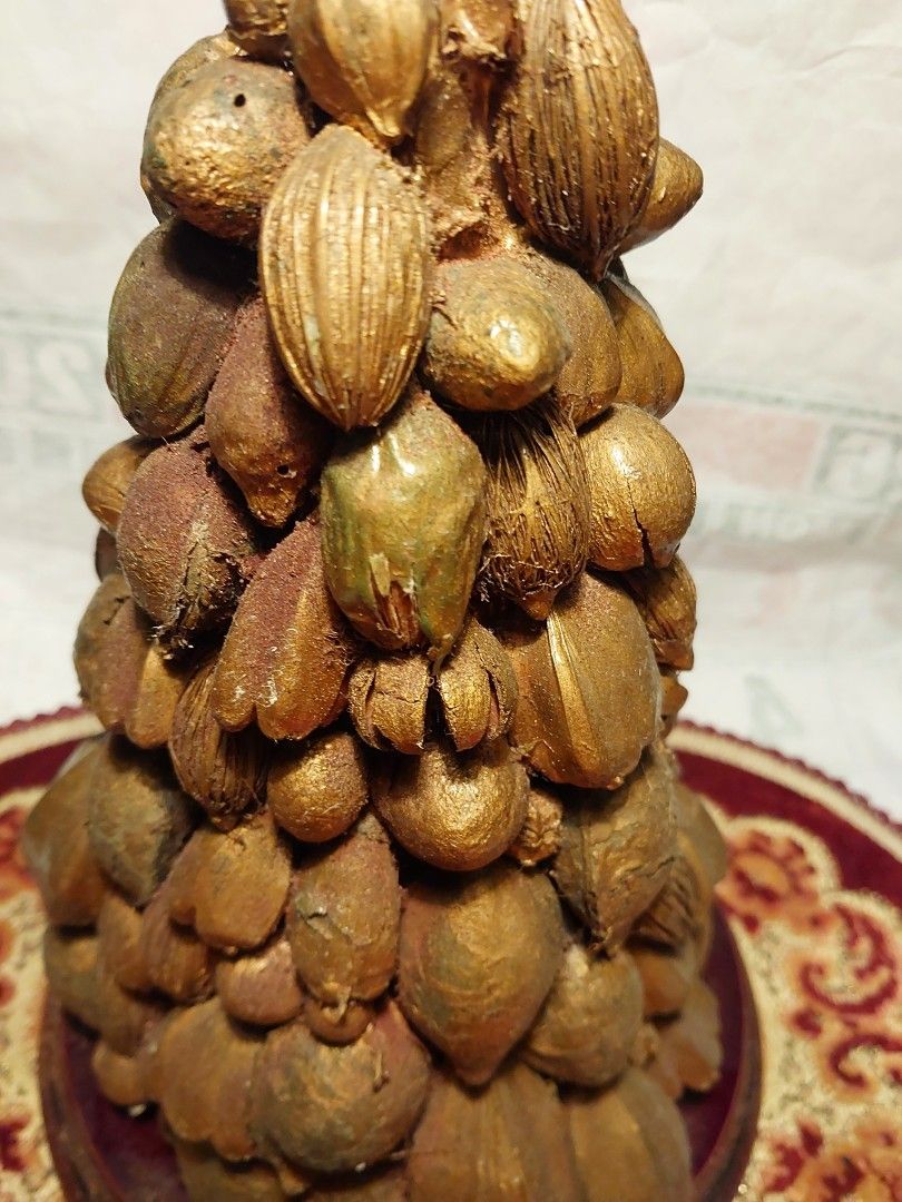 Unique Gold Nut and Seed Decorative Tree (Category: Other Home Decor) located in Manila. Submitted by bryantoyshop (Listing ID 1459249056, Image 2). Description: - Handmade decorative tree - Covered in various nuts and seeds, all painted gold - Sits on a wooden base with a decorative mat - Unique piece for home decor - Great conversation starter - Measures approximately 11 inches tall.