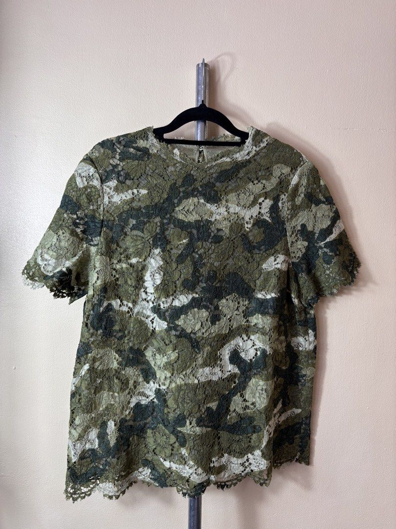 Valentino Green Camouflage Tops (Category: Shirts) located in Manila. Submitted by earlylifecrisis (Listing ID 1459184417, Image 1). Description: Sz 44 Condition 9/10 Measure it by inch Width: 19 Length: 26 Shoulder:15 Sleeve:9 Bust: 13.5 Hem: 20.5 •Refund / Returns not allowed allowed •Please do check the dimensions size on labels sometimes are not accurate on the sizing •Ask me before purchasing.