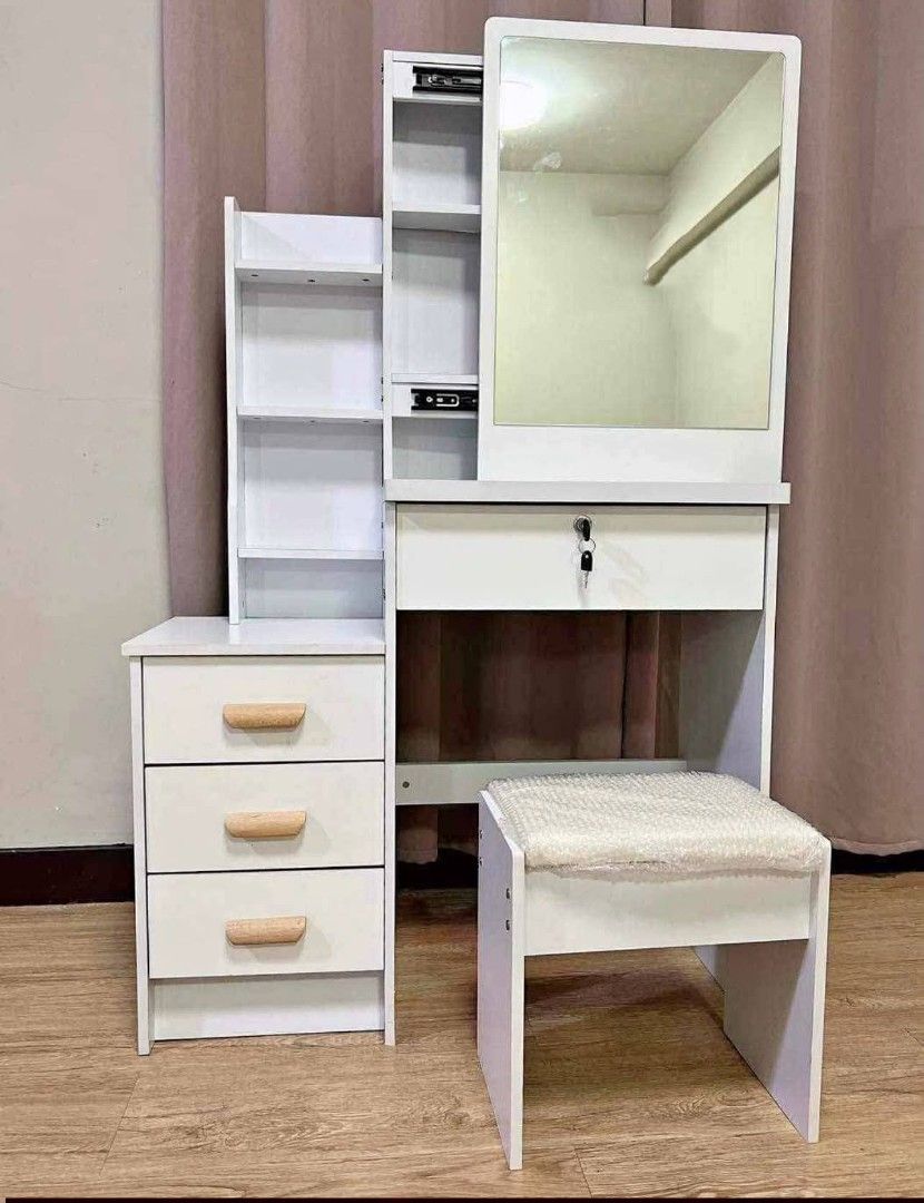 Vanity Table with Mirror, Stool, and Storage (Category: Tables & Sets) located in Caloocan City. Submitted by swiftflower_802790 (Listing ID 1459188873, Image 3). Description: - Complete dressing table set with mirror and matching stool. - Ample storage with built-in shelves and drawers. - Organize your makeup and accessories with ease. - Available in a variety of attractive colors. - Compact design ideal for bedrooms of all sizes..