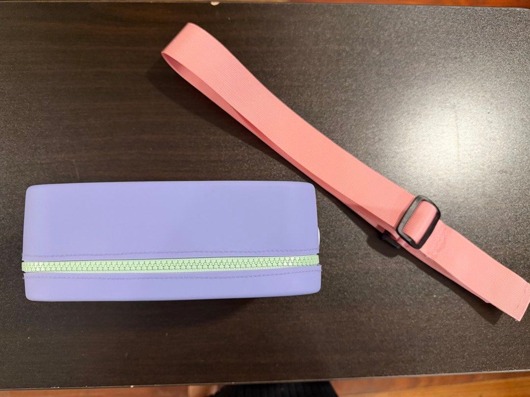 Viajecito Splashkit in periwinkle w pink strap (Category: Cross-body Bags) located in Quezon City. Submitted by PrelovedTreasureees (Listing ID 1459156551, Image 3). Description: Periwinkle Viajecito splashkit CLASSIC + pink adjustable strap - First photo is a reference pic (the strap that comes with the bag I’m selling is pink not yellow) - Purchased on the blue app on Nov 2021 for 2,785 for both the bag + the strap (they were sold separately) -