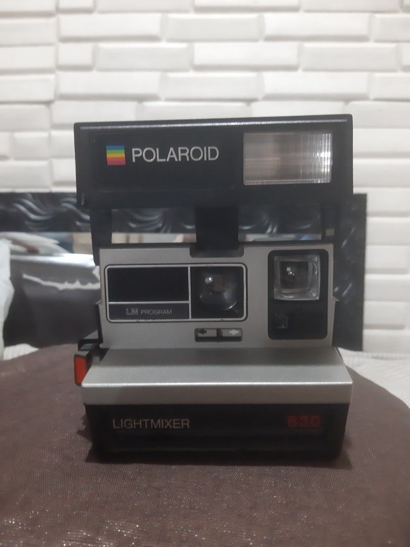 Vintage Polaroid Lightmixer 630 Instant Camera (Category: Cameras) located in Pateros City. Submitted by epicwolf_5ad9d8 (Listing ID 1459237474, Image 1). Description: Vintage Polaroid Lightmixer 630 instant camera, Includes strap. Uses 600 film. Perfect for instant photos!.