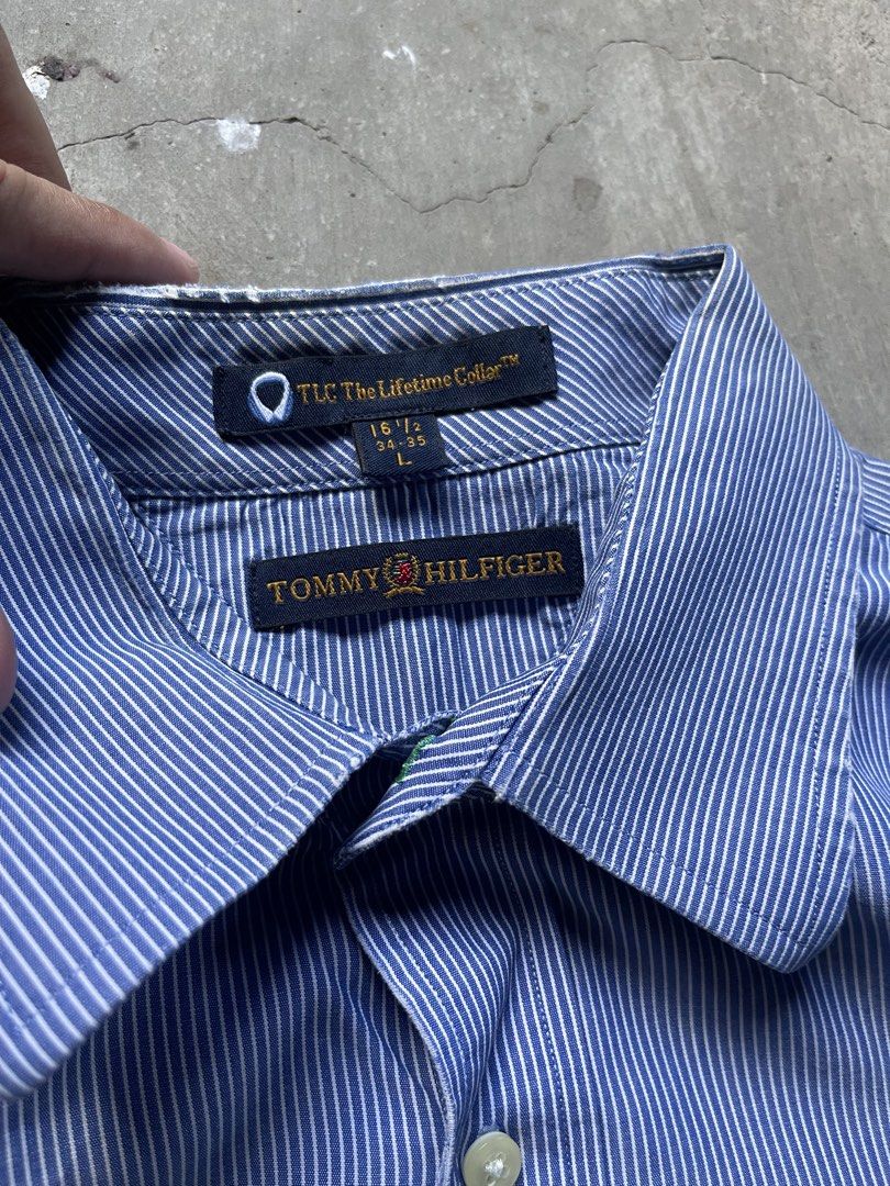 Vintage Tommy Hilfiger button down shirt (Category: Tshirts & Polo Shirts ) located in Cabuyao City. Submitted by jam_mandilag (Listing ID 1459212477, Image 3). Description: Width:26 Length:30.5 Tag: Tommy Hilfiger Size: xxl Color Rate: 8/10 Condition: 8/10 Issue: distress on collar Mode of payment: Gcash Mode of shipping: J&T and lalamove For more information kindly click the “send message button” and other details of the item. Location: cabuyao