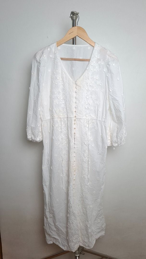 White Button Front Lace Maxi Dress with 3D Flowers (Category: Dresses) located in Quezon City. Submitted by spacematcha (Listing ID 1459249696, Image 2). Description: Maje Roxitane Cotton Embroidered Midi Dress - Intricate all-over 3D Flowers - V-neckline with button-down front - Comfortable elasticated waist - Balloon sleves - Pure cotton - Washable stain due to storage Fits M-L Length: 48" Width: 19" Gcash payment Shipping via Grab/Lalamove or 