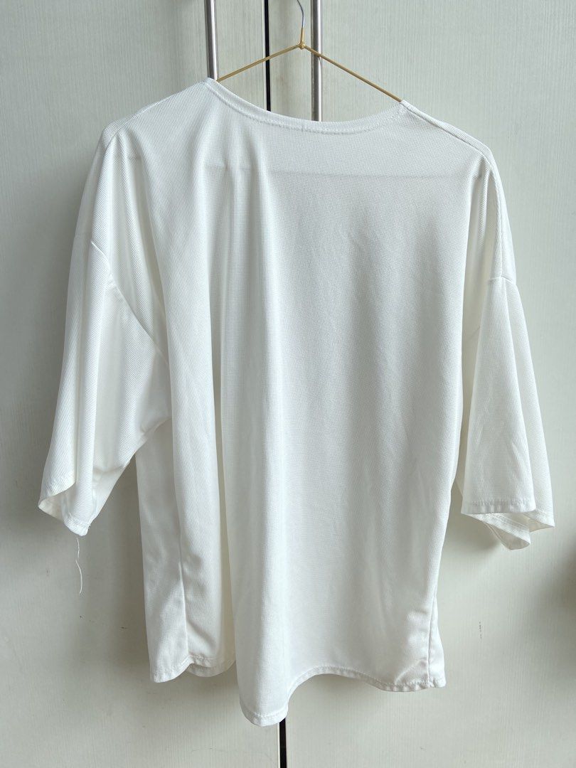 White Kimono Cardigan (Category: Coats, Jackets and Outerwear) located in Mandaluyong City. Submitted by coolmami (Listing ID 1459142861, Image 2). Description: -BUY 2 ITEMS FROM CLOTHES - Lightweight white cardigan - Open front style - Three-quarter sleeves - Textured fabric - Versatile layering piece.