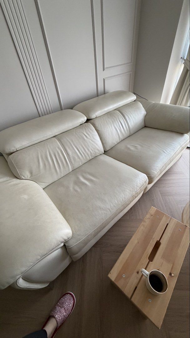 White Leather Sofa with Reclining Function (Category: Sofas) located in Kuala Lumpur. Submitted by melcheng82 (Listing ID 1453293321, Image 2). Description: 2.5 seater full leather reclining sofa. Self collection Note: Leather is worn and will need replacement but motor etc is all working very well..