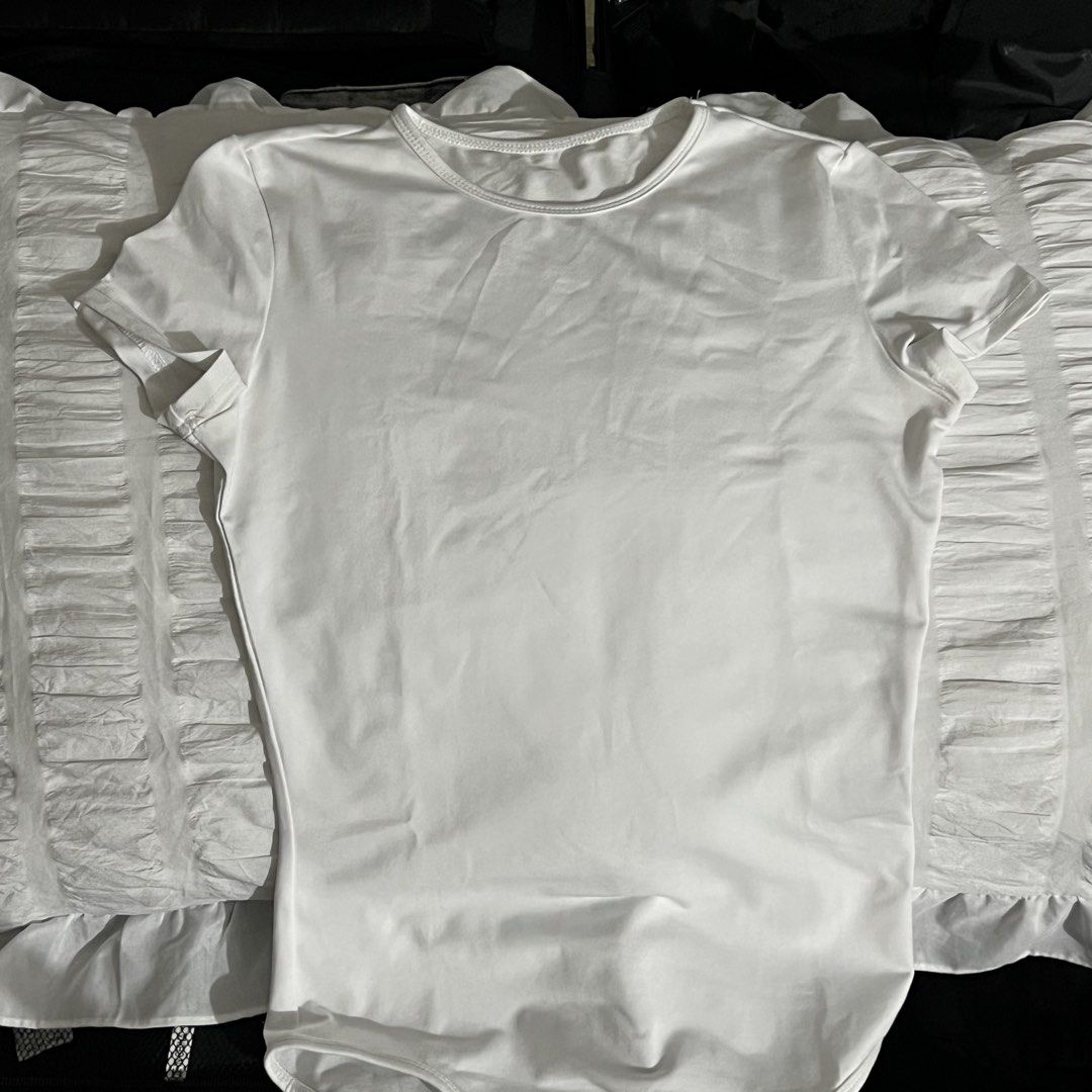 White Short Sleeve Bodysuit (Category: Others Tops) located in Manila. Submitted by love.kyrst (Listing ID 1459262016, Image 3). Description: - Basic white short sleeve bodysuit - Classic crew neck style - Stretchy material for ultimate comfort - Easy snap closure at the bottom - Versatile: wear it alone or layer it up!.