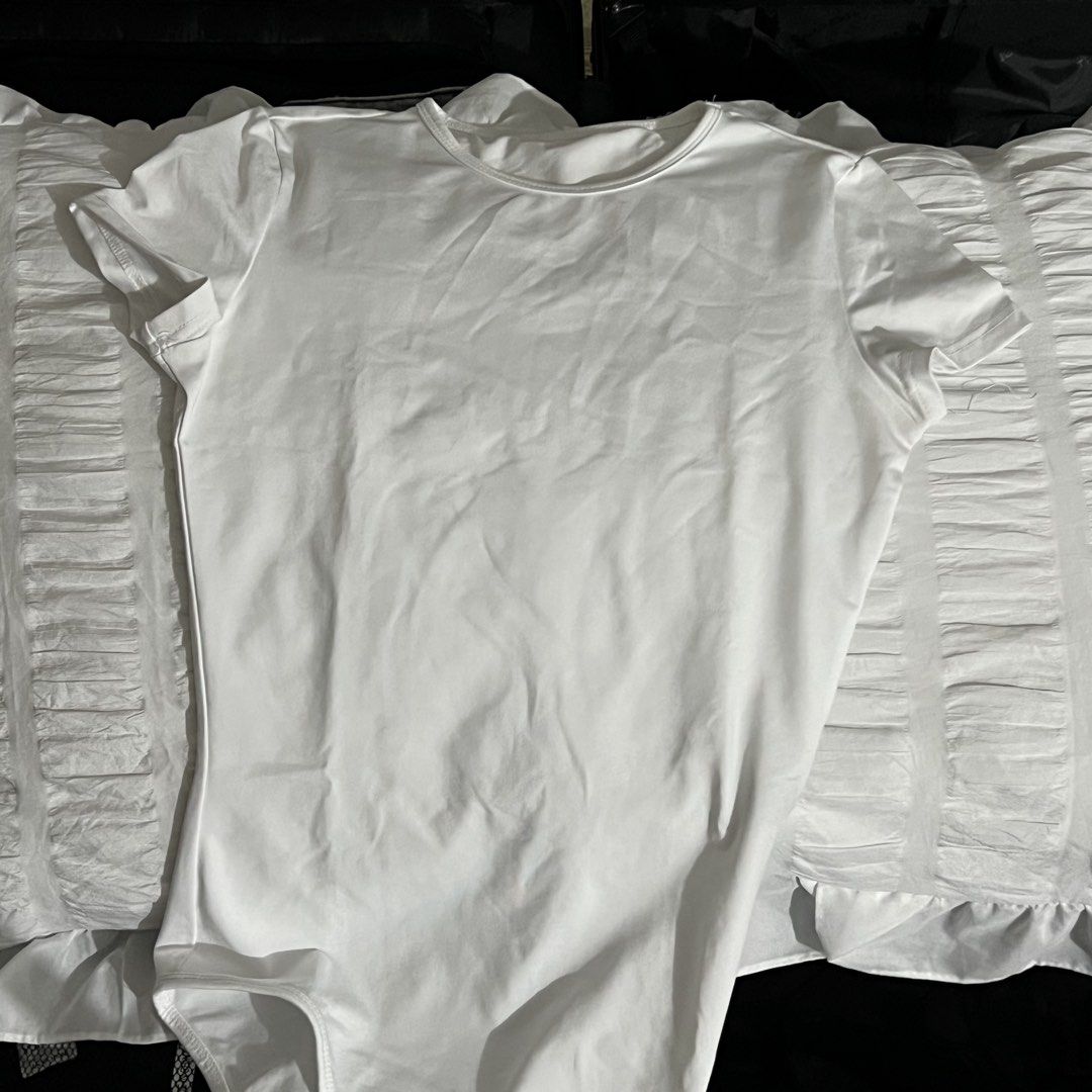 White Short Sleeve Bodysuit (Category: Others Tops) located in Manila. Submitted by love.kyrst (Listing ID 1459262016, Image 1). Description: - Basic white short sleeve bodysuit - Classic crew neck style - Stretchy material for ultimate comfort - Easy snap closure at the bottom - Versatile: wear it alone or layer it up!.
