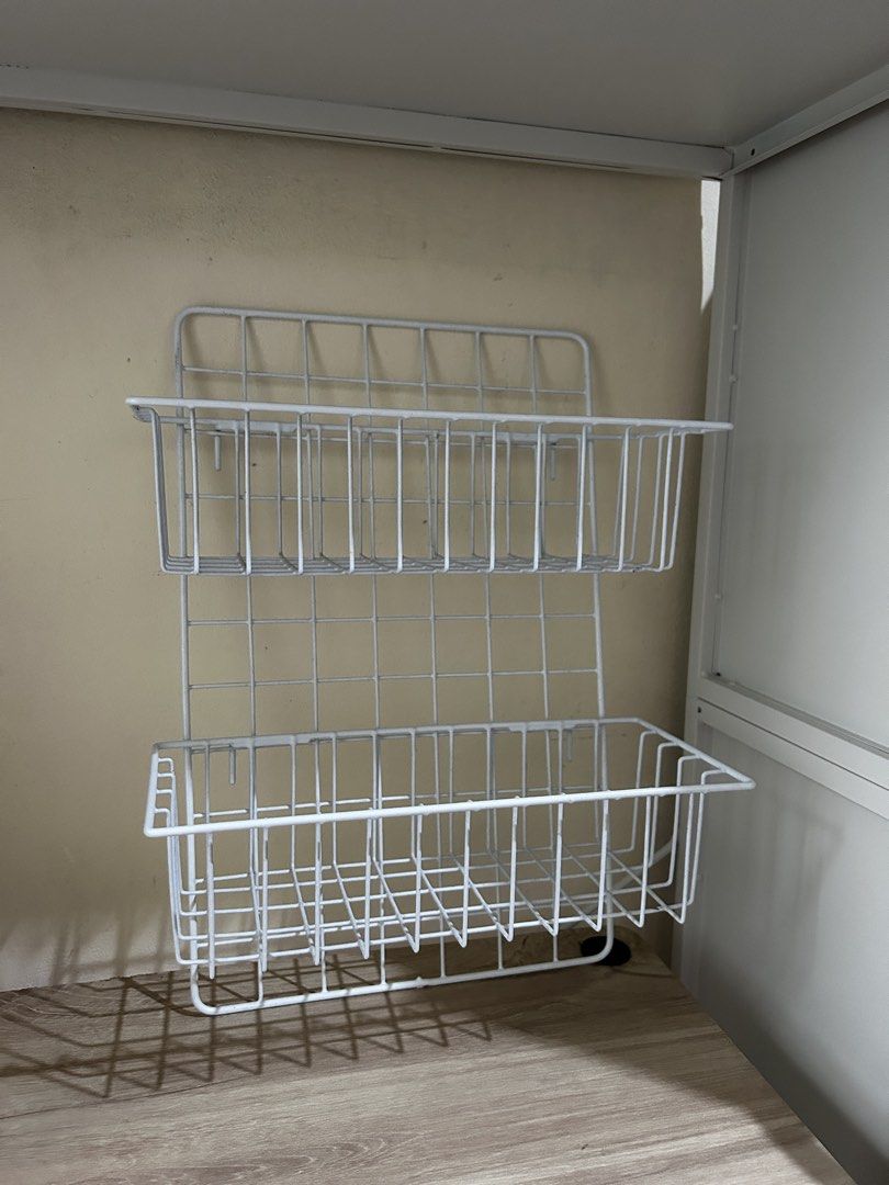 White Wire Grid Storage Rack with 2 Baskets (Category: Storage Boxes & Baskets) located in Manila. Submitted by noorcubesss (Listing ID 1459258113, Image 1). Description: - White wire grid storage rack - Includes 2 wire baskets that attach to the grid - Ideal for organizing small items - Versatile: Mount on the wall or place on a surface - Perfect for kitchens, bathrooms, or craft rooms Grid - 10x15 inches Basket - 5x11.5 inches Saglit lang po gi