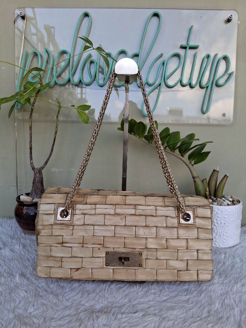 Woven Genuine Exotic Eel Leather Shoulder Bag with Chain Strap (Category: Shoulder Bags) located in Mandaluyong City. Submitted by shams2026 (Listing ID 1459121829, Image 1). Description: - Light tan woven leather bag - Back to back double faced bag - 2 compartments - All-over woven texture - Secure metal clasp closure - Interior has a few small marks - Ideal for evening wear and special occasions or everyday OOTD bag - Japan sourced exotic leath