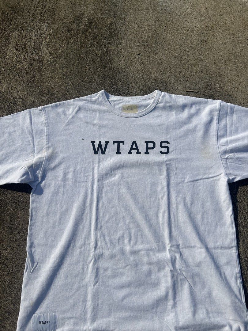 WTAPS T-shirt White (Category: Tshirts & Polo Shirts ) located in Manila. Submitted by 609_thrifts (Listing ID 1459201775, Image 2). Description: - Classic white WTAPS t-shirt - Simple logo graphic on the front - heavy cotton - (24x30) - fits (L-XL).