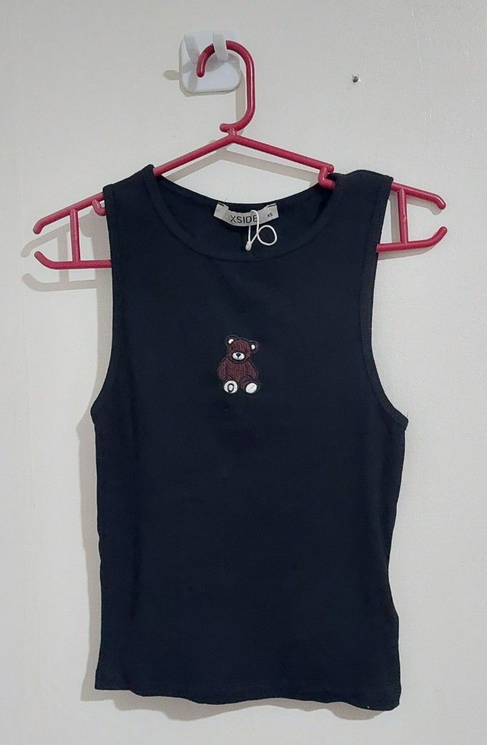 Y2K Minimalist Embroidered Bear Black Cami Top (Category: Sleeveless) located in Pasay City. Submitted by pompompie (Listing ID 1459156155, Image 1). Description: Y2k Black Cotton Cami Top Brand new, unused Size: XS Fabric: Cotton TAGS: cottagecore, softgirl, softcore, fairycore, dark academia, y2k, garden goth, goth, punk, preppy, streetwear, kawaii, art hoe, mod, model off duty, grandmacore, biopunk, boho, emo, clubkid, lolita, hip-hop, skater,