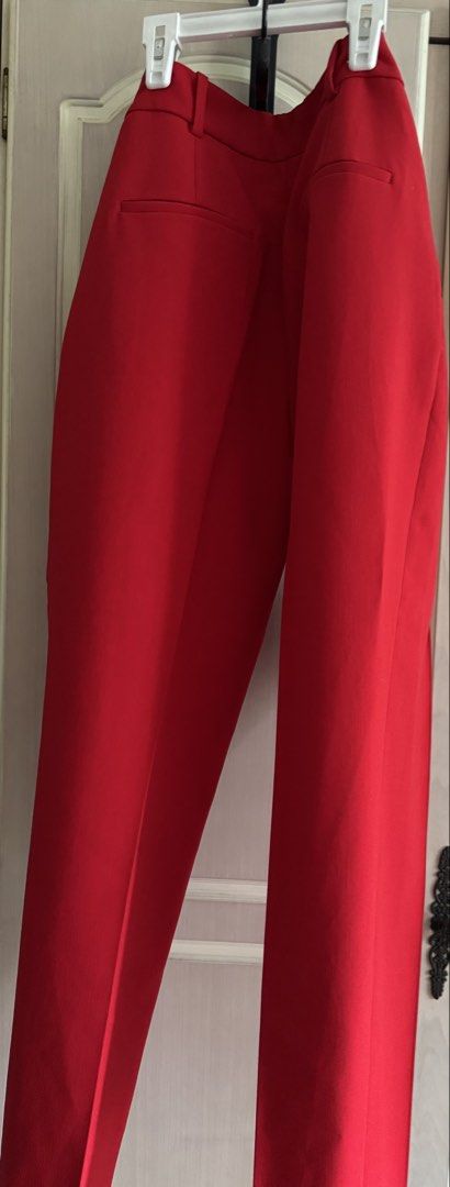 Zara Red Tailored Trousers XS (Category: Other Bottoms) located in Quezon City. Submitted by happibruce (Listing ID 1459146805, Image 3). Description: - Zara Red Tailored Trousers - Size: XS - Made in Spain - Classic fit - Vibrant red color - Perfect for dressing up or down.
