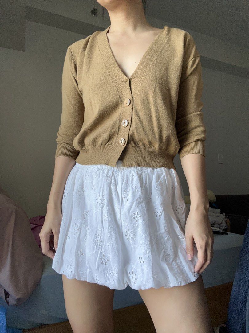 2 Avenue Cropped V-Neck Button-Up Cardigan (Category: Coats, Jackets and Outerwear) located in Makati City. Submitted by magwayr19 (Listing ID 1462916891, Image 2). Description: - Lightweight cropped cardigan from 2 Avenue - Neutral brown color - V-neckline with button-up front - Can be worn open or closed - Slightly oversized fit - Ideal for layering over tops or dresses.