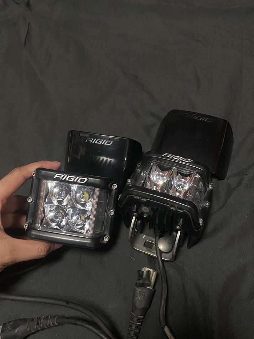 2x RIGID D-SS Series LED Lights with Covers (Category: Body Parts and Accessories) located in Caloocan City. Submitted by wayneitems (Listing ID 1462943538, Image 2). Description: - RIGID D-SS Series LED Lights (Pair) - Cube style with 4 LEDs per light - Includes two black RIGID covers - Ideal for off-road vehicles and trucks - Wiring included - Sold as a set.