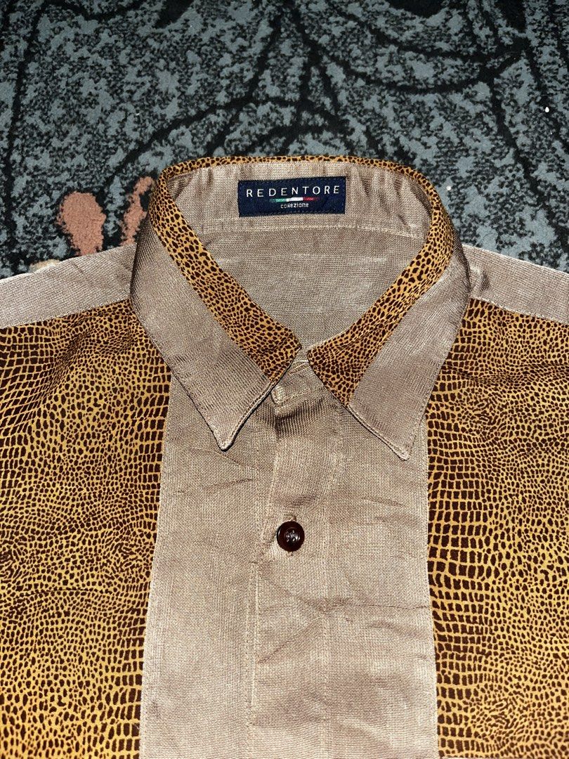 90’s REDENTORE Crocodile Patterned (Category: Formal Shirts) located in Manila. Submitted by kashjulliane (Listing ID 1462968075, Image 2). Description: Brand: REDENTORE Collezione Era: 1990s / Retro Mod Material: 100% Polyester (often featuring a soft, textured finish) Design Features: Asymmetrical patchwork construction, reptile/crocodile skin patterned print, single front utility pocket. Excellent condition Good as new Made in Japan High quali