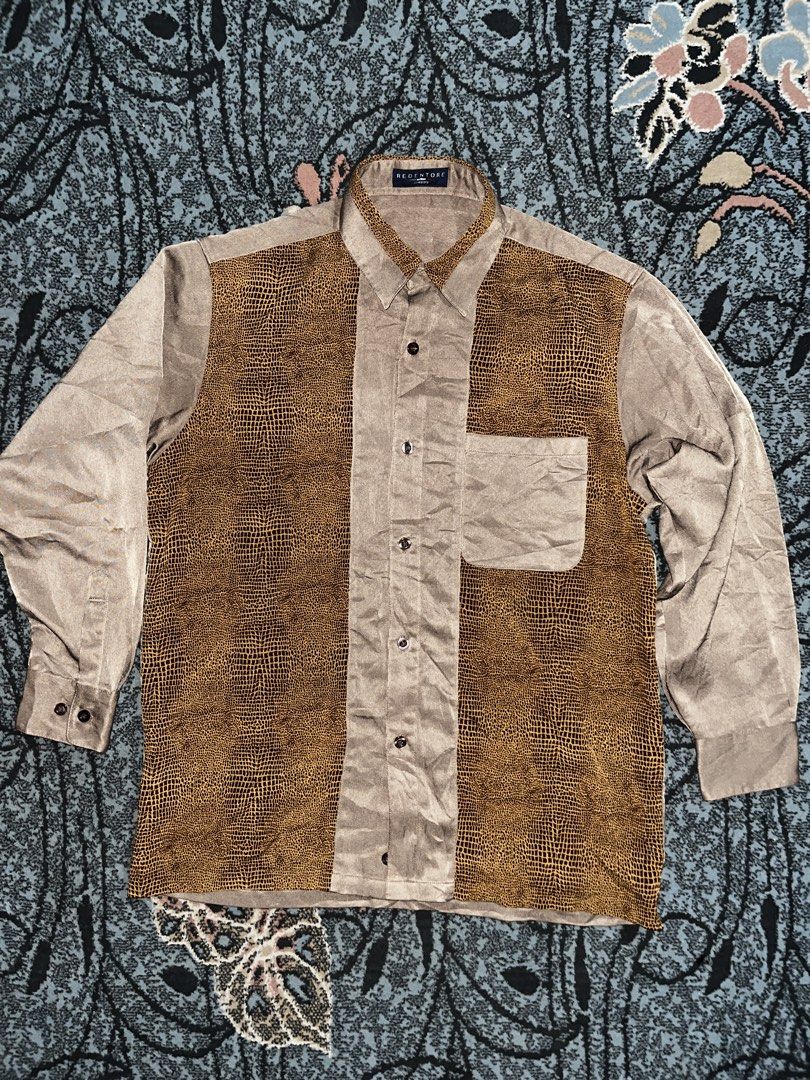 90’s REDENTORE Crocodile Patterned (Category: Formal Shirts) located in Manila. Submitted by kashjulliane (Listing ID 1462968075, Image 1). Description: Brand: REDENTORE Collezione Era: 1990s / Retro Mod Material: 100% Polyester (often featuring a soft, textured finish) Design Features: Asymmetrical patchwork construction, reptile/crocodile skin patterned print, single front utility pocket. Excellent condition Good as new Made in Japan High quali