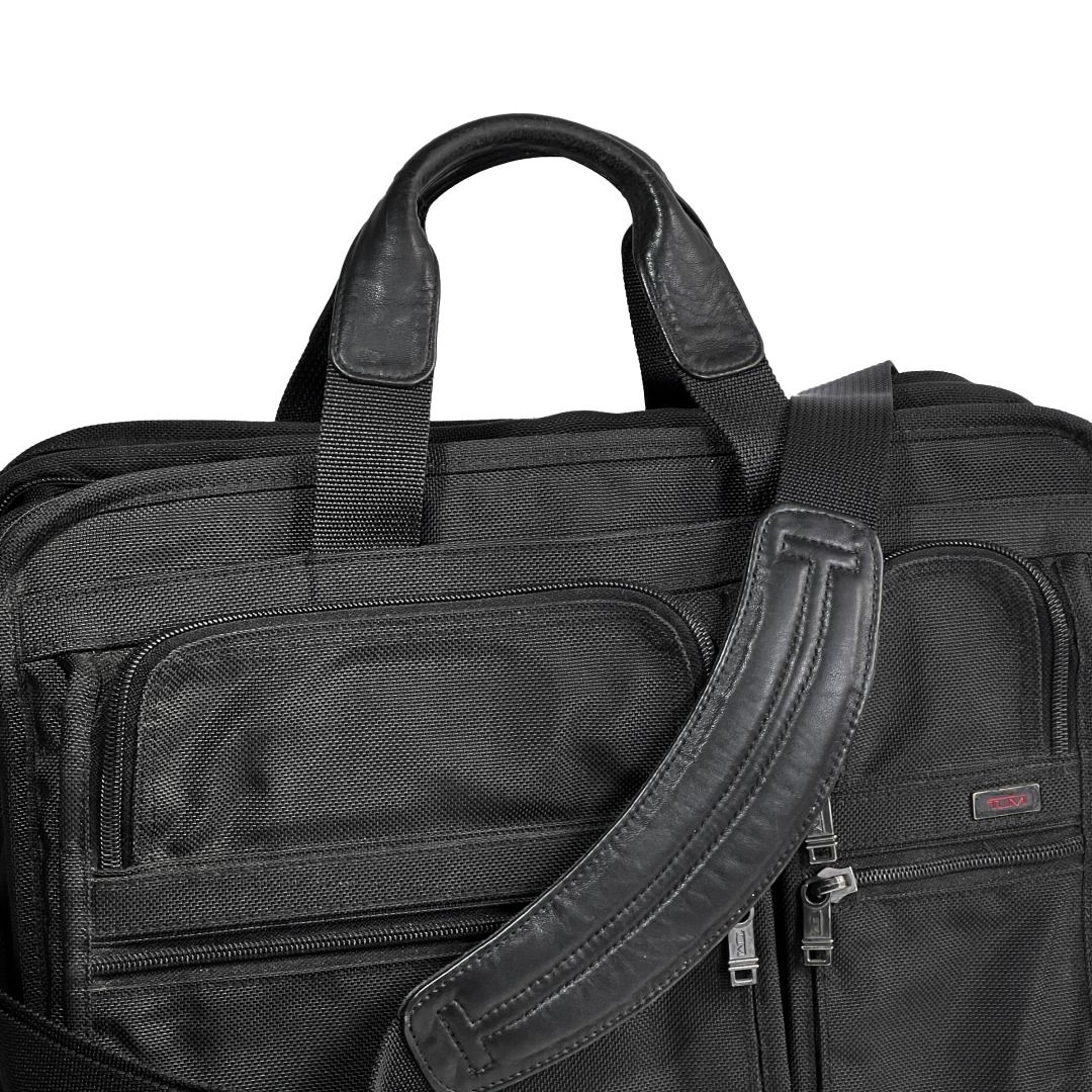 🟢 TUMI Alpha 26041D4 Black Ballistic Nylon Expandable Organizer Laptop Briefcase / Authentic (Category: Luxury Bags & Wallets) located in Malabon City. Submitted by k.1006 (Listing ID 1463076401, Image 2). Description: Overview • Authentic TUMI Alpha Expandable Organizer Computer Brief • Style 26041D4 • Crafted in black ballistic nylon with contrasting leather details and metal hardware. • Spacious, multi-compartment business briefcase featuring