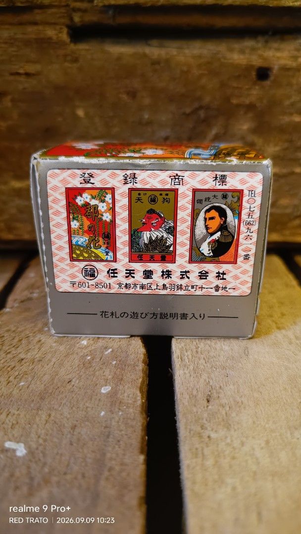 💯 Vintage Nintendo Hanafuda Playing Cards Box (Category: Board Games & Puzzles) located in General Mariano Alvarez. Submitted by randzwurkz85264 (Listing ID 1463037022, Image 3). Description: - Bnew Original Nintendo Hanafuda playing cards box - Features classic Japanese artwork on packaging - Includes instruction manual - Collectible item for Nintendo enthusiasts - Box shows some signs of age but is in good overall condition - Rare find for col