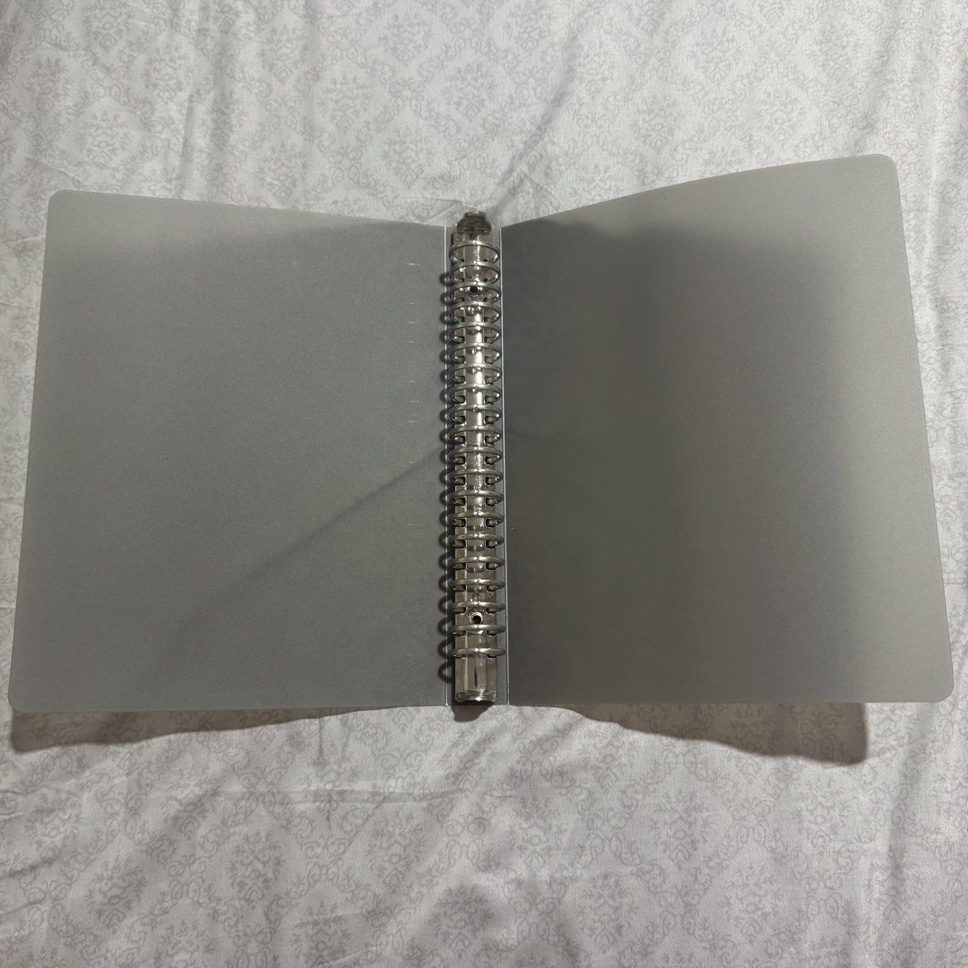 A5 Frosted Grey Binder with Silver Ring (Category: Stationery & School Supplies) located in Antipolo. Submitted by nyeahsells (Listing ID 1462974515, Image 2). Description: RFS: decluttering Disclaimer: - All sales final (NO RETURN, NO EXCHANGE) - Our shop will not be liable for any damages due to mishandling by the courier - Please manage expectations - First to pay gets the item (NO RESERVATIONS) FAQS: - MOP: GCASH only - MOD: Gogo Xpress, LBC 