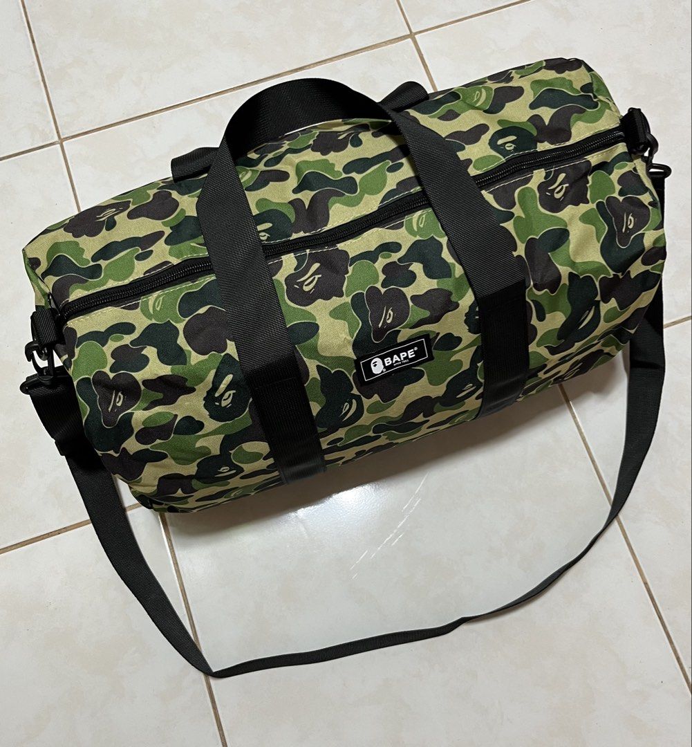 A BATHING APE CAMO DUFFLE BAG (Category: Backpacks) located in Cavite. Submitted by drip_syndicate (Listing ID 1463102598, Image 2). Description: -35 LITERS CONDITION: 9.5/10 COLOR RATE: 9.5/10 NO ISSUE .