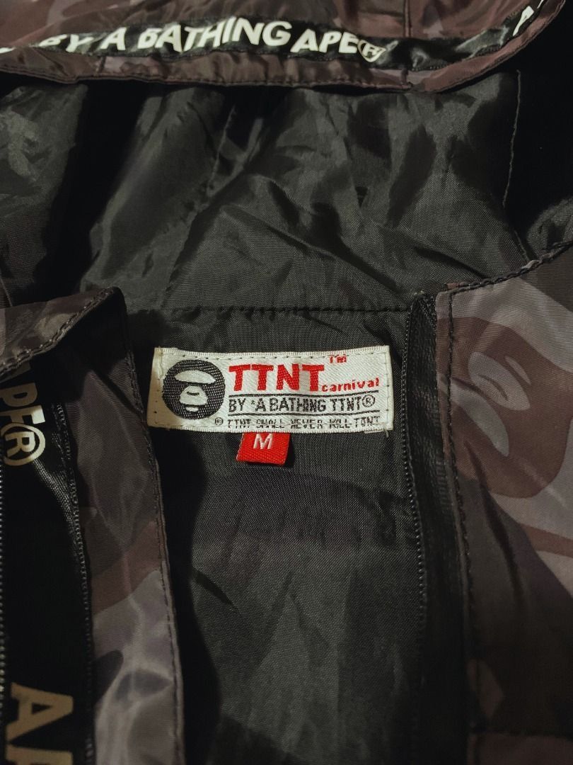 AAPE BY * A BATHING APE CAMO PANELLED WINDBREAKER JACKET (Category: Coats, Jackets and Outerwear) located in Antipolo. Submitted by YRKs_Store (Listing ID 1463002584, Image 3). Description: Aape by *A Bathing Ape Camo Panelled Windbreaker Jacket - Color is not faded; no stains or tears - Stitches, prints, and rubber Aape emblem badge are in good condition - Only issue -> slight peeling on upper right chest print (as can be seen in the photo) - Wi