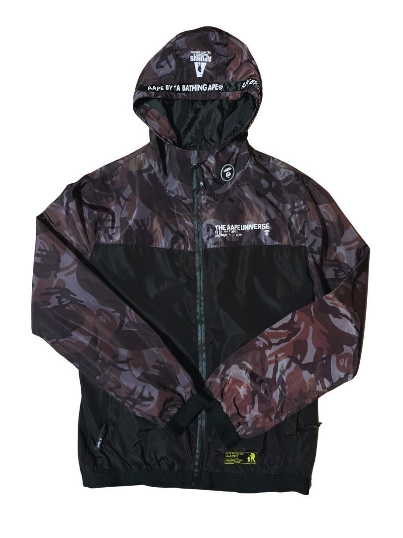 AAPE BY * A BATHING APE CAMO PANELLED WINDBREAKER JACKET (Category: Coats, Jackets and Outerwear) located in Antipolo. Submitted by YRKs_Store (Listing ID 1463002584, Image 1). Description: Aape by *A Bathing Ape Camo Panelled Windbreaker Jacket - Color is not faded; no stains or tears - Stitches, prints, and rubber Aape emblem badge are in good condition - Only issue -> slight peeling on upper right chest print (as can be seen in the photo) - Wi
