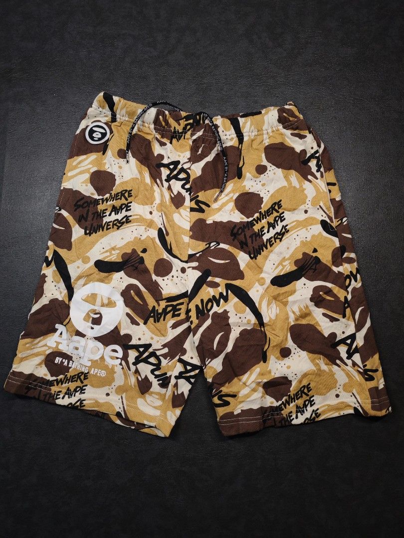 Aape Camouflage Sweat Shorts (Category: Shorts) located in Kalibo. Submitted by relivethearchives (Listing ID 1463030215, Image 1). Description: Aape Camouflage Sweat Shorts in Excellent Condition Size Medium on tag DIMES Waist: 28 stretch up to 33 Length: 19.