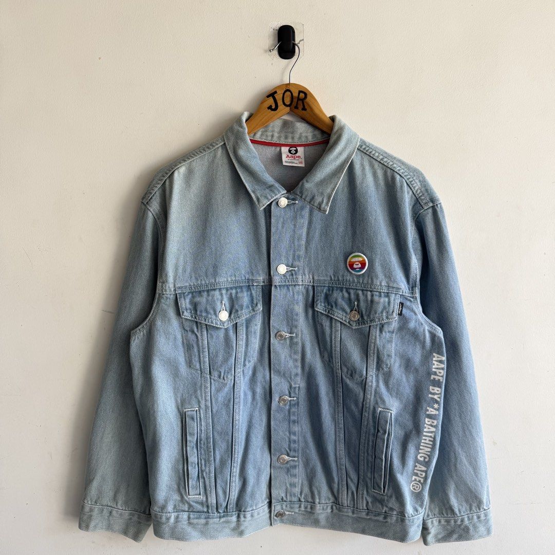 Aape Light-Wash Denim Jacket (Category: Coats, Jackets and Outerwear) located in San Fernando. Submitted by jorjorr (Listing ID 1463038532, Image 1). Description: Aape Light-Wash Denim Jacket Rainbow logo patch at the back Embroidered Logo Xs on tag 22 width 26 length Best fit small to medium Excellent condition No issue P1,899.