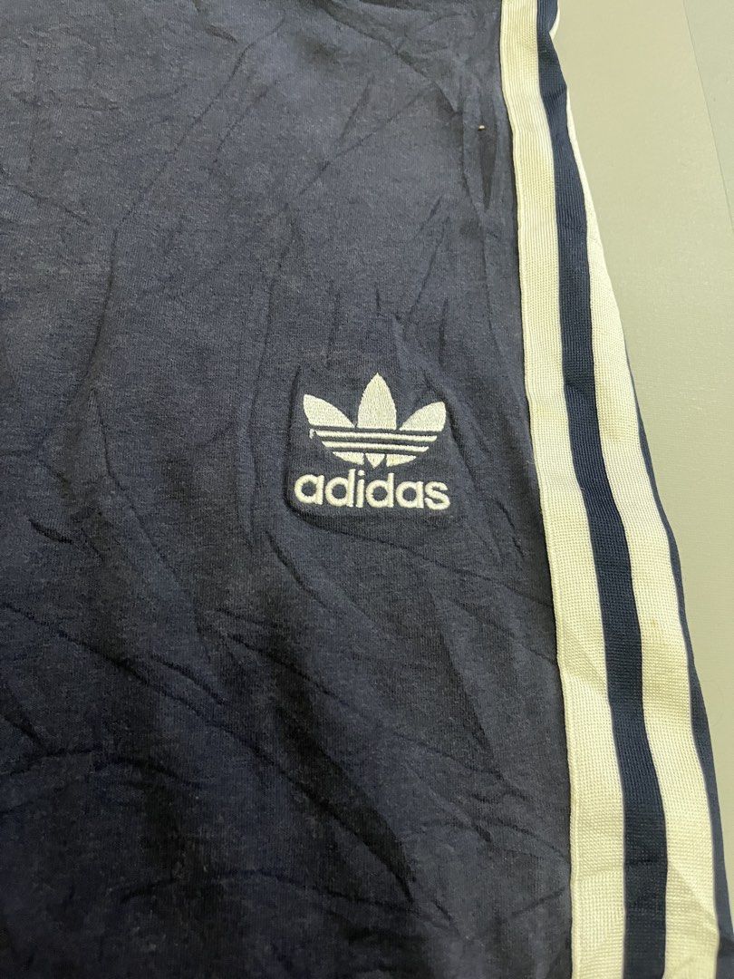 Adidas 3 Stripes Mini Skirt Navy Blue (Category: Skirts) located in Mabalacat. Submitted by aas_thriftfings (Listing ID 1462929256, Image 2). Description: - Navy blue Adidas mini skirt - Features classic three stripes on sides - Iconic trefoil logo - Comfortable elastic waistband - Ideal for casual or sporty looks - Pairs well with t-shirts and crop tops.