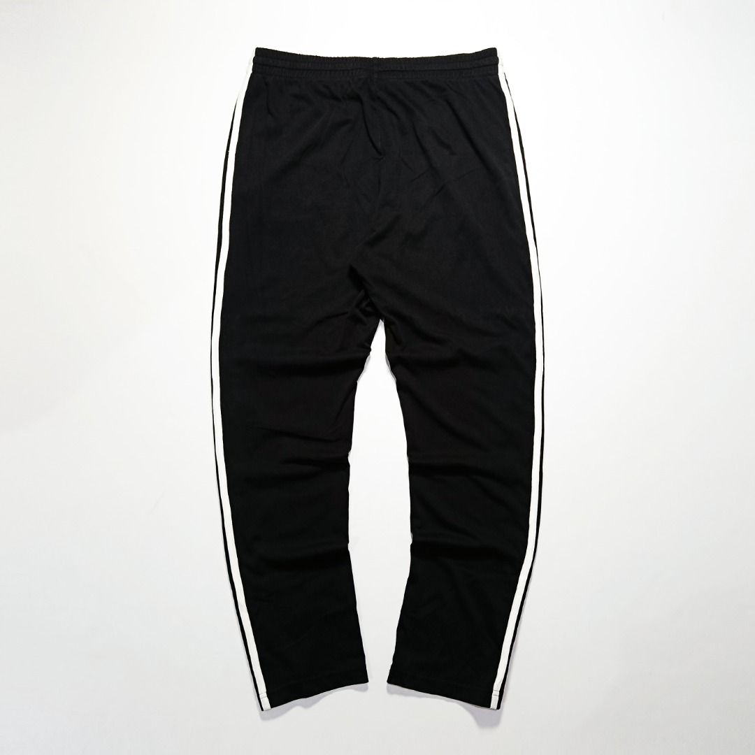 Adidas 3-Stripes Black Track Pants (Category: Joggers) located in Taytay. Submitted by hoodgrail.vtg (Listing ID 1462956083, Image 2). Description: • Excellent condition - Lightly used • Classic white 3-Stripes detail with embroidered adidas logo • Size on tag: M — best fits W33 • Measurements: 16.5 x 42 in • Leg opening: 7 in • Color rate: 9.5/10 • Issue: None.