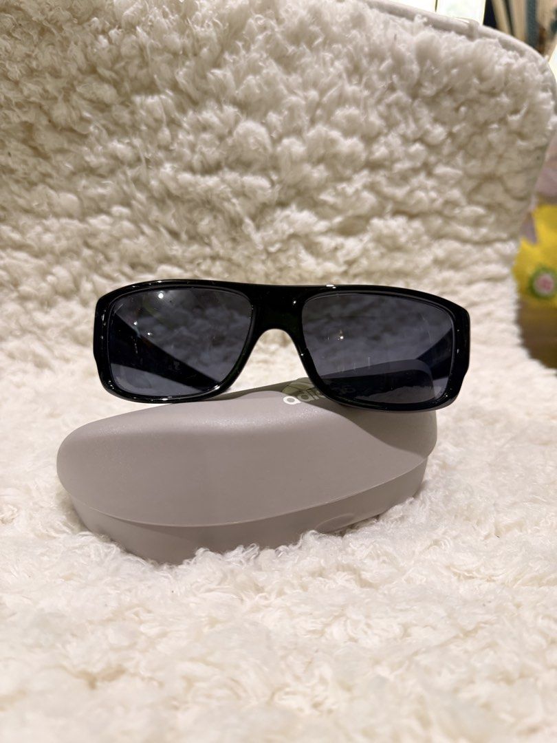 Adidas Kundo A374 00 6050 with Case (Category: Sunglasses & Eyewear) located in Carmona. Submitted by ccdlrs (Listing ID 1463099524, Image 1). Description: - Brand: Adidas - Model: Adidas Kundo A374 00 6050 - Frame Color: Glossy Black - Features: White Adidas logo on sides - Includes: Original hard case, drawstring pouch No scratches Rfs: declutter.