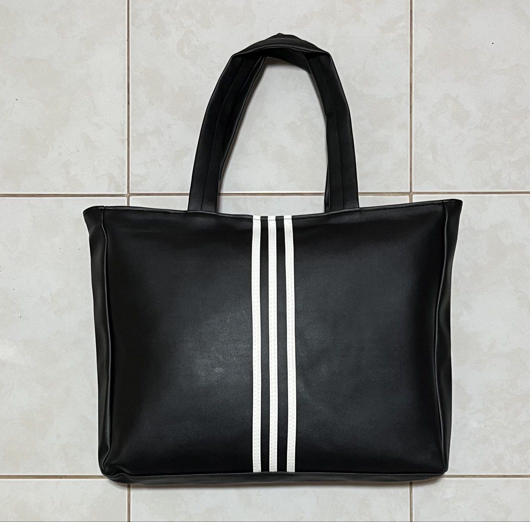 ADIDAS POLYURETHANE LEATHER TOTE BAG (Category: Tote Bags) located in Cavite. Submitted by drip_syndicate (Listing ID 1463102538, Image 2). Description: CONDITION: 9.5/10 COLOR RATE: 9.5/10 NO ISSUE .