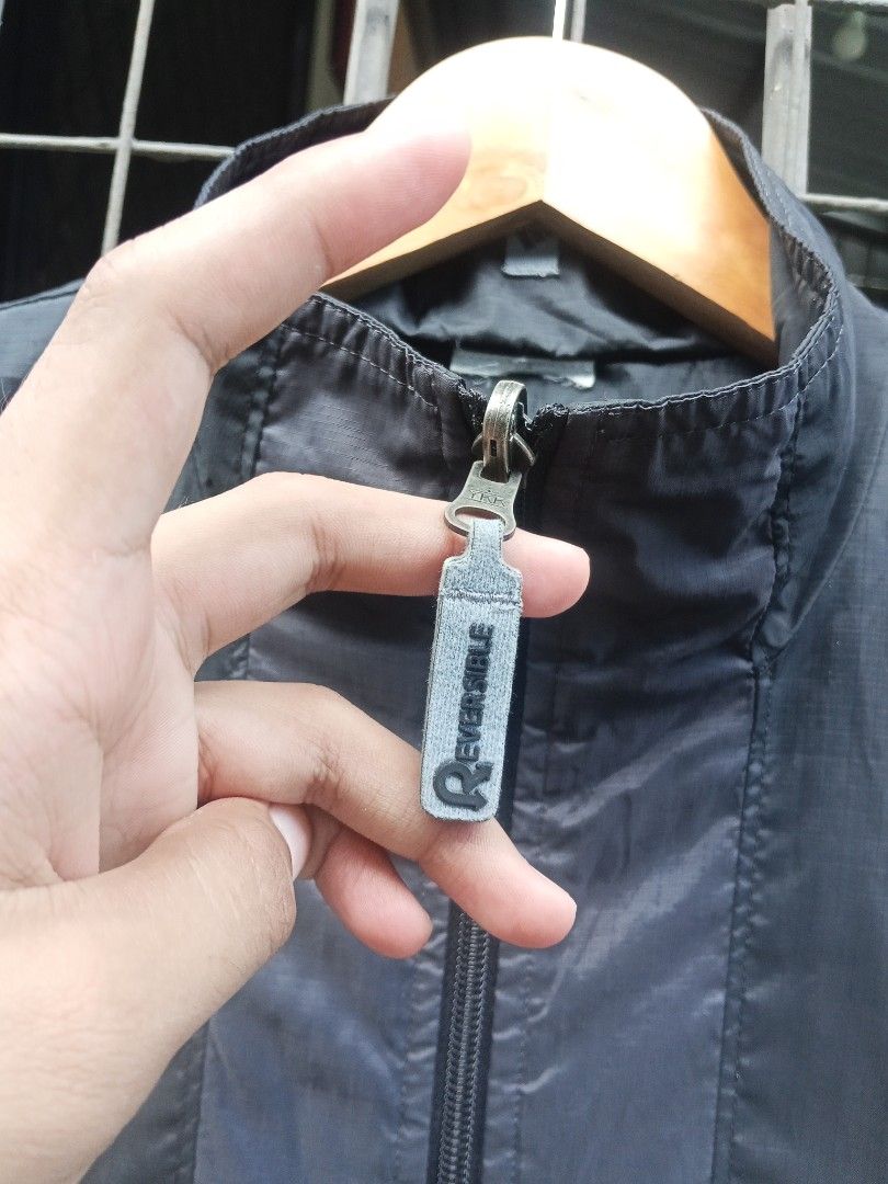 Adidas Reversible Vest Black (Category: Vests) located in Lingayen. Submitted by rahzzelula73279 (Listing ID 1463066130, Image 3). Description: - Black Adidas vest - Size M - Lightweight and sleeveless - Multiple zippered pockets on the front - Reversible zipper pull - Made in Vietnam - Ideal for layering or active wear.
