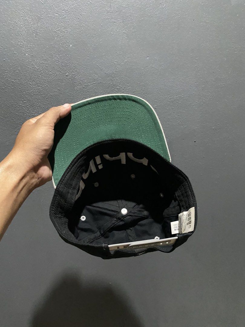 Adidas Snapback Cap Black White Grey (Category: Caps & Hats) located in Lucena. Submitted by handpickthrift (Listing ID 1462937142, Image 2). Description: - Classic black Adidas snapback - Bold white embroidered Adidas logo on the front - Light grey brim - Adjustable strap at the back for a comfortable fit - Perfect for everyday wear.