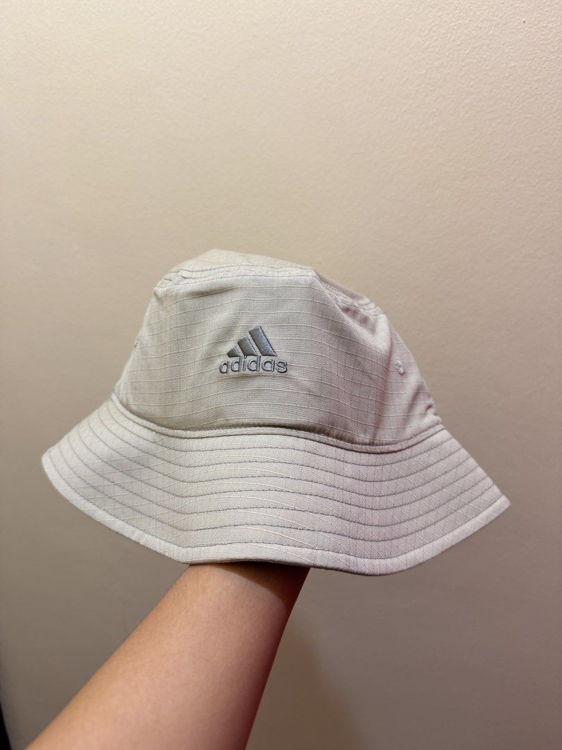Adidas Sportswear Bucket Hat (Category: Other Sports Equipment and Supplies) located in Manila. Submitted by specter2026 (Listing ID 1462887299, Image 1). Description: - Adidas bucket hat - Color: Putty Grey / Grey Three - Brand new with tags attached - Comes in original recycled plastic bag - Size: One Size Fits Most (OSFM) - Ideal for sunny weather and completing a streetwear outfit - selling for the original price but negotiable RFS: won’t be 