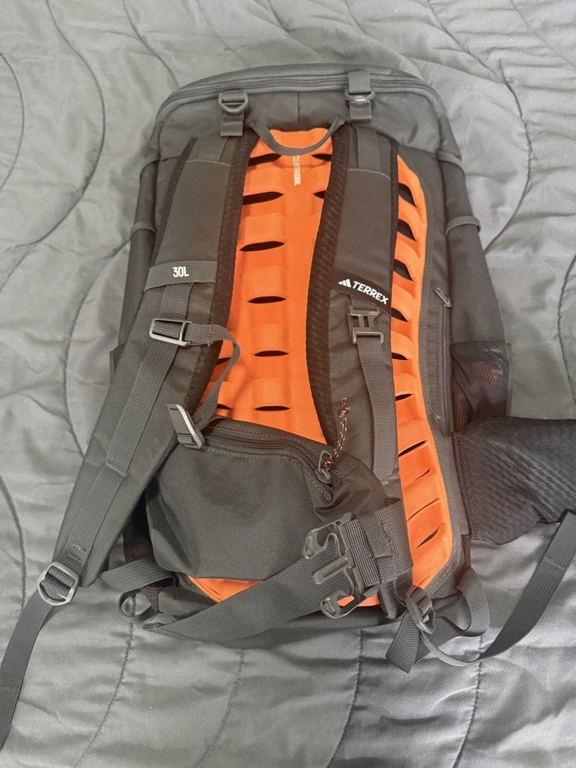 Adidas Terrex 30L Backpack (Category: Backpacks) located in Mandaluyong City. Submitted by pam_1026 (Listing ID 1462899998, Image 2). Description: - Adidas Terrex Backpack - 30L Capacity - Ideal for Hiking and Travel - Bright Orange Interior Lining - Multiple Compartments and Pockets for Organization - Padded Straps and Back Panel for Enhanced Comfort .