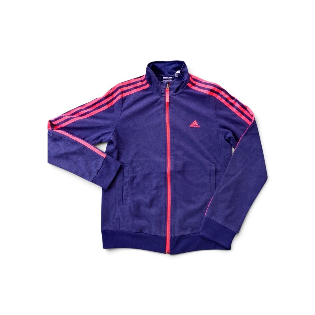 Adidas Track Jacket Purple Pink Stripes (Category: Coats, Jackets and Outerwear) located in Las Pinas. Submitted by solisjethr46316 (Listing ID 1462938421, Image 1). Description: - Purple Adidas track jacket - Pink stripes on sleeves and front zipper - Two side pockets - Ribbed cuffs and hem - Perfect for casual wear or sports.