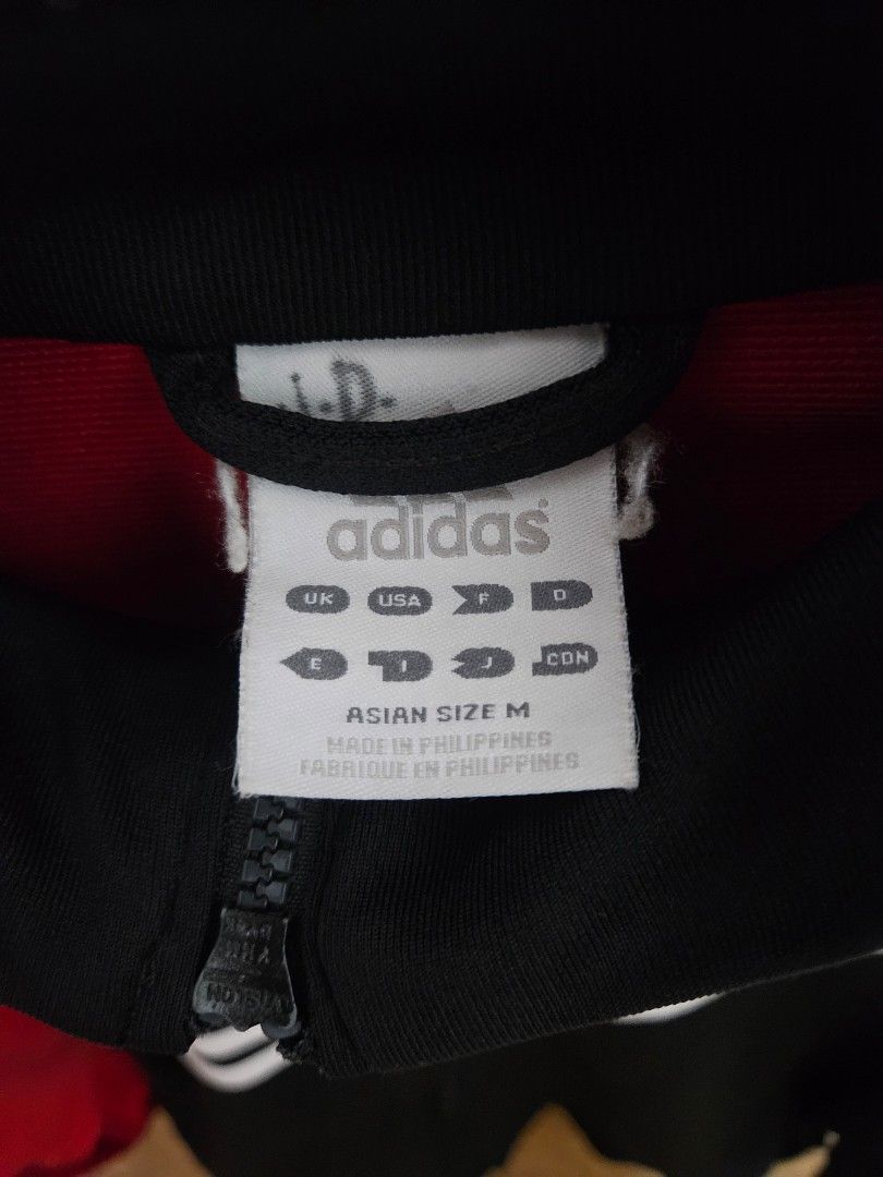 Adidas Track Jacket Red Black White Stripes Size M (Category: Coats, Jackets and Outerwear) located in Quezon City. Submitted by jeannego (Listing ID 1462951715, Image 3). Description: - Adidas Track Jacket - Color: Red and Black with White Stripes - Full Zip Closure - Size: Medium (Asian Fit) - Ideal for Sports or Casual Wear.