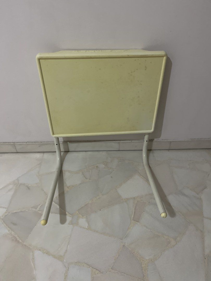 Adjustable Height Foldable Side Table (Category: Tables & Sets) located in Singapore. Submitted by hellofh (Listing ID 1463030282, Image 2). Description: Self collection at Bishan 50*40cm - Lightweight and portable - Adjustable height for versatile use - Folds flat for easy storage - Top surface has some marks from use - Ideal for snacks, drinks, or a small workspace.