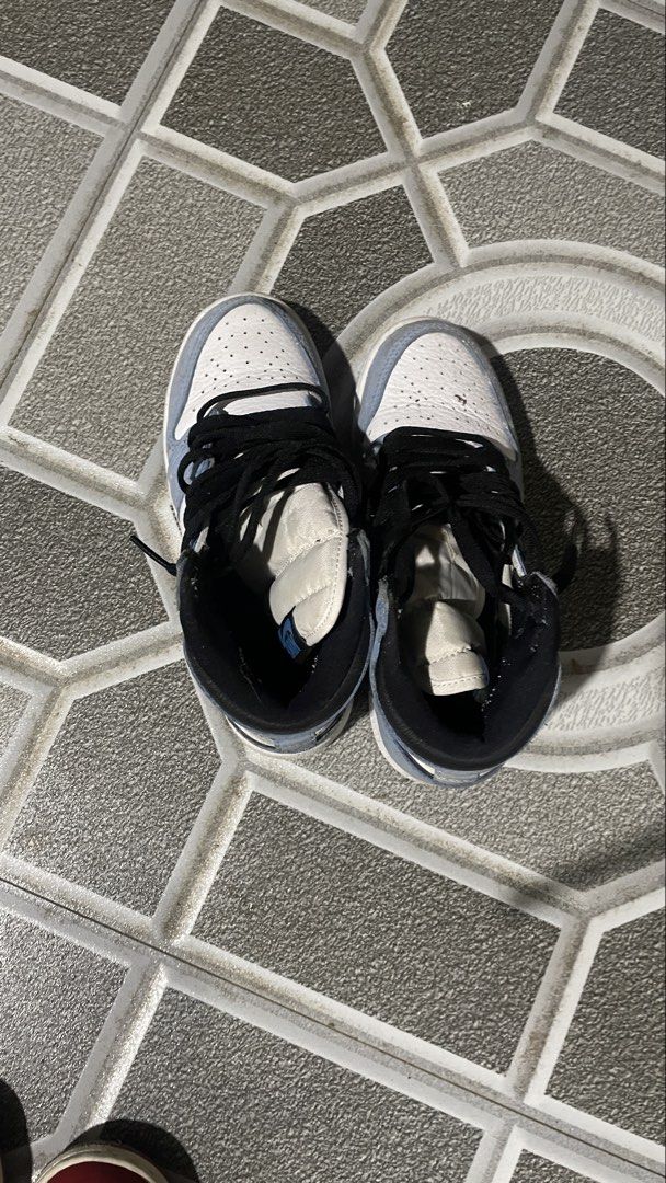 Air Jordan 1 High University Blue (Category: Sneakers) located in Iloilo. Submitted by puzzles_xxx (Listing ID 1462900547, Image 1). Description: - Air Jordan 1 High 'University Blue' - Classic high-top silhouette - Colorway: White, light blue, and black laces - Condition: Shows some signs of wear on soles and uppers (please check photos for details) - Made in China.