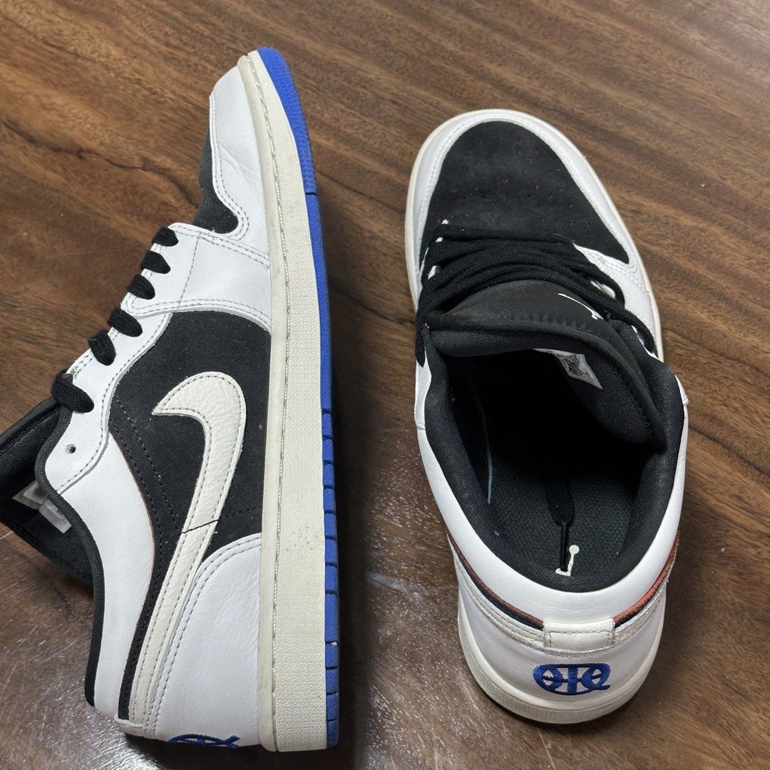 Air Jordan 1 Low OG "Black White" (Category: Sneakers) located in Cebu City. Submitted by jennierubyjane01 (Listing ID 1463027994, Image 2). Description: - Air Jordan 1 Low OG - Classic Black and White colorway - Low-top silhouette - Features Jumpman logo on tongue and heel - Blue accent on the outsole - Ideal for casual wear.