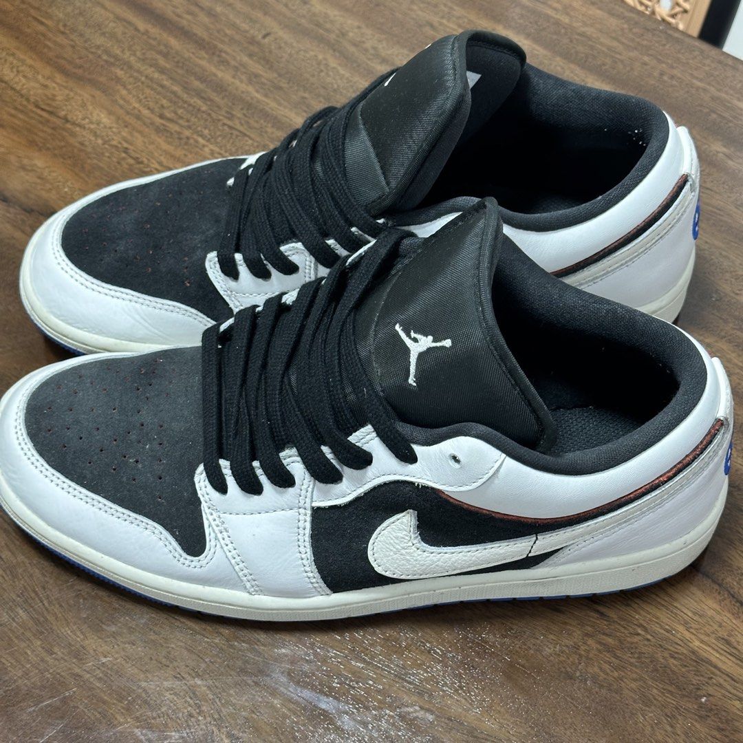 Air Jordan 1 Low OG "Black White" (Category: Sneakers) located in Cebu City. Submitted by jennierubyjane01 (Listing ID 1463027994, Image 1). Description: - Air Jordan 1 Low OG - Classic Black and White colorway - Low-top silhouette - Features Jumpman logo on tongue and heel - Blue accent on the outsole - Ideal for casual wear.