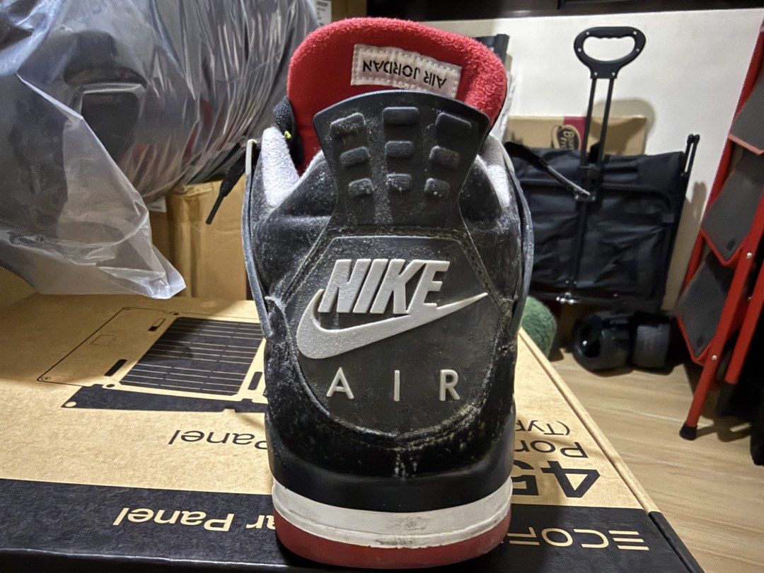Air Jordan 4 “Black Cement” / “Bred” (Category: Sneakers) located in Manila. Submitted by flicker_33 (Listing ID 1463049453, Image 3). Description: - Air Jordan 4 "Black Cat" sneakers - Classic black and red colorway - Still has plenty of life left - Great for casual wear or collectors - Grab these iconic kicks!.