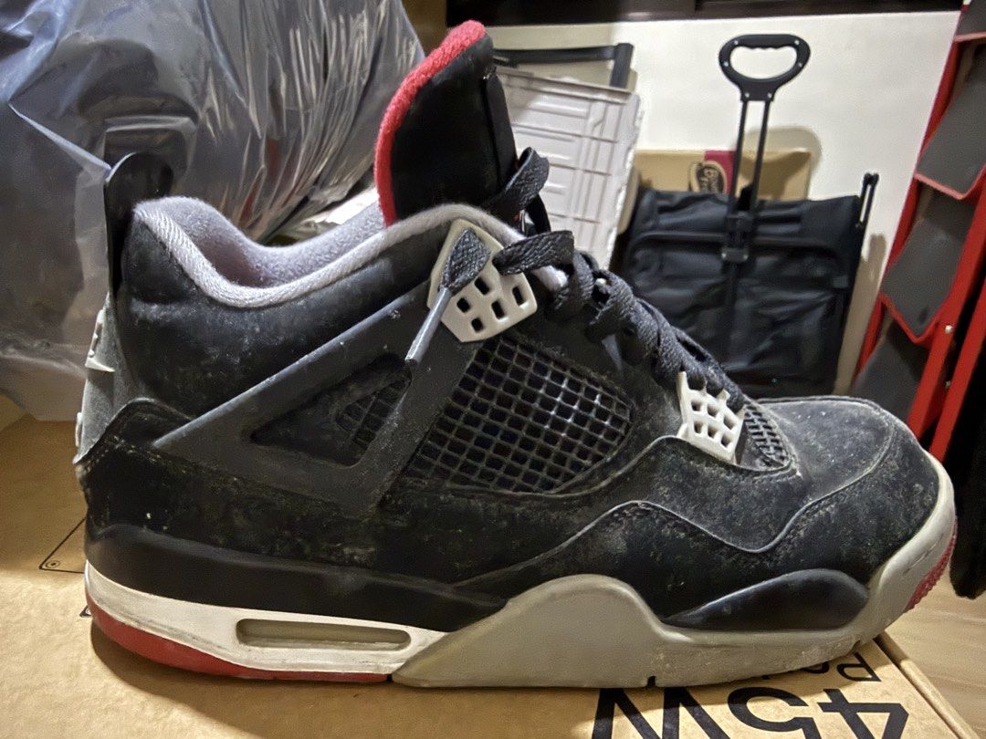 Air Jordan 4 “Black Cement” / “Bred” (Category: Sneakers) located in Manila. Submitted by flicker_33 (Listing ID 1463049453, Image 2). Description: - Air Jordan 4 "Black Cat" sneakers - Classic black and red colorway - Still has plenty of life left - Great for casual wear or collectors - Grab these iconic kicks!.