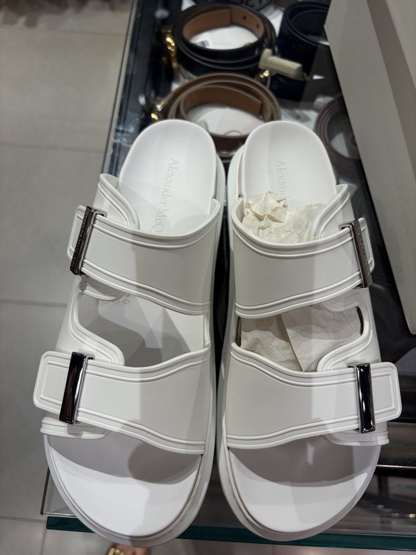 Alexander McQueen Black and White Rubber Slides Sandals (Category: Flats & Sandals) located in Cavite. Submitted by tripleKgels (Listing ID 1463046549, Image 3). Description: - Authentic Alexander McQueen slides in sleek black. - Durable and easy-to-clean rubber material. - Stylish double strap design with elegant silver buckle detail. - Comes complete with original dust bag and box. - Ideal for effortless casual styling. Black: 36/36.5/37/40 Whi