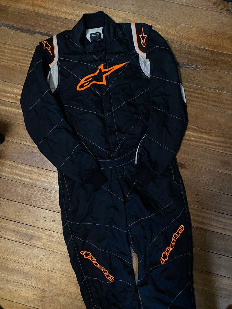 ALPINESTARS GP RACE SUIT (Category: Activewear) located in Cavite. Submitted by safehawk-c9a684 (Listing ID 1463055639, Image 1). Description: ALPINESTARS GP RACE SUIT 🏁🔥 Rare motorsport / racing suit from Alpinestars Black with orange detailing Size: US 36 / EU 46 thrifted Good overall condition Authentic Alpinestars labels & ID details Made in Romania / Designed & Developed in Italy Perfect for racing, motorsport collection, display, or enthu